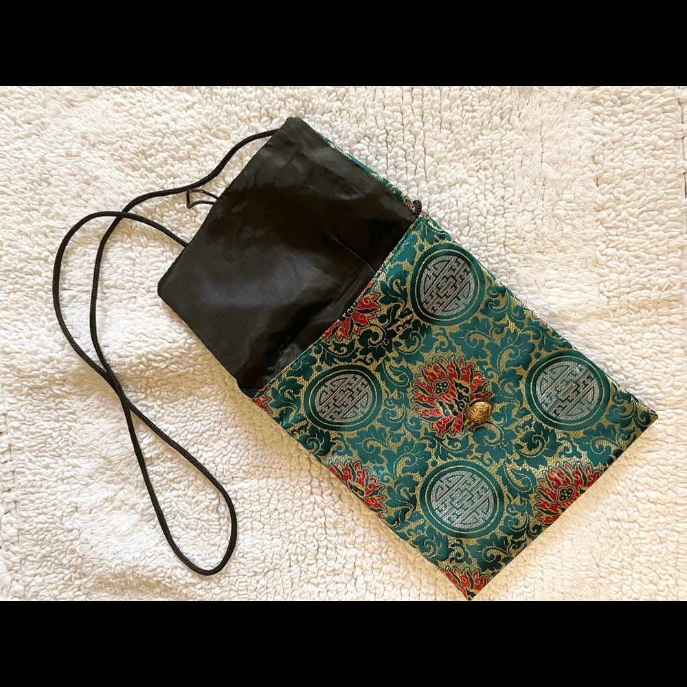 Small bag with brass bell